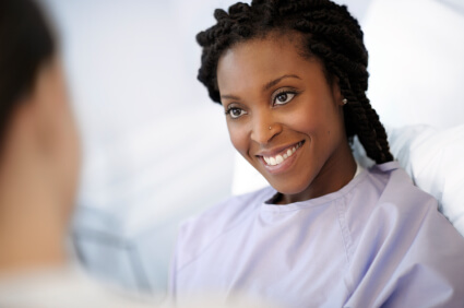 A Woman Smiling At an Appointment